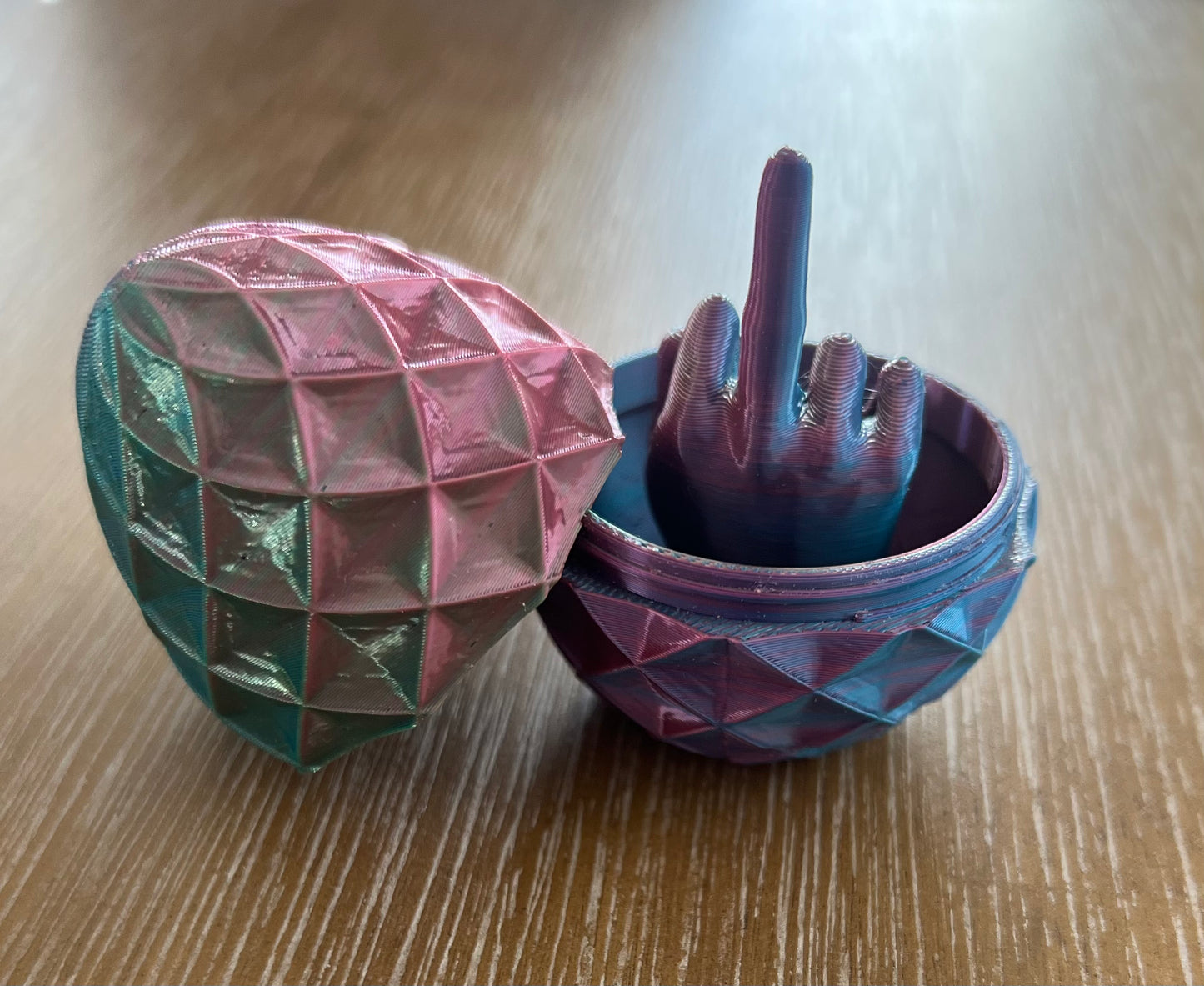 Middle finger egg surprise