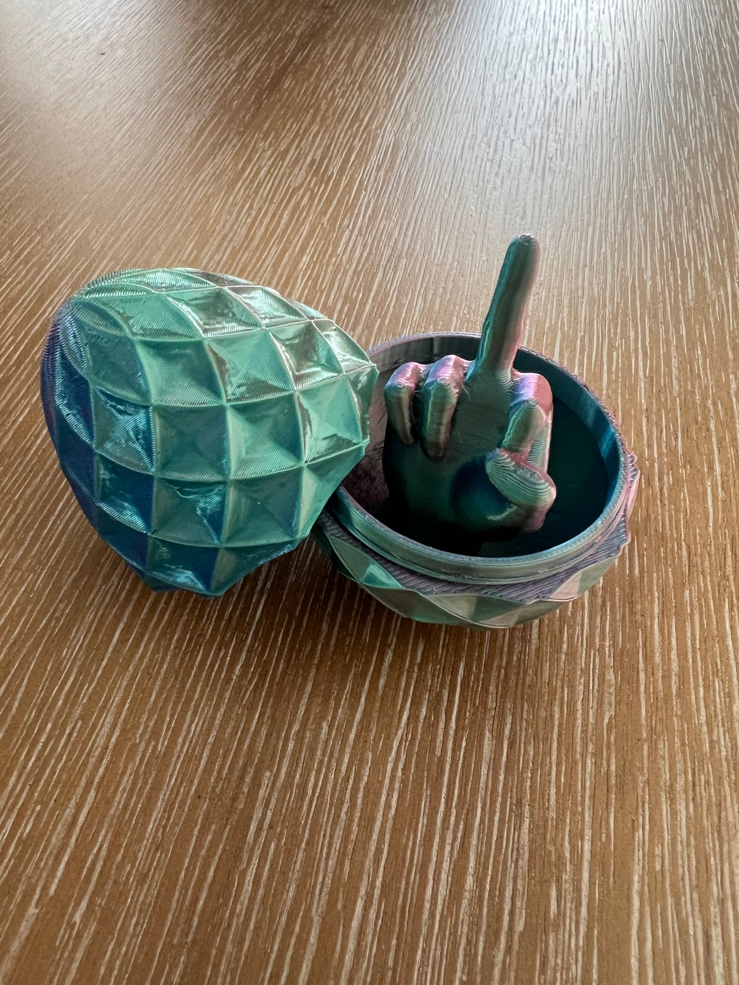 Middle finger egg surprise